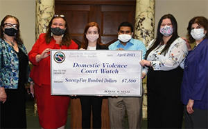 members of family violence clinic with donors