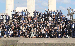 photo of large group of students posing outside
